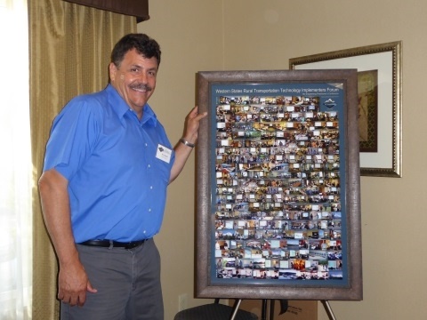 Ian Turnbull is a founder of the Western States Forum. In recognition of his efforts, when he retired he was presented with a framed collage depicting the Forum over the past ten years. 
	Photo by Leann Koon.