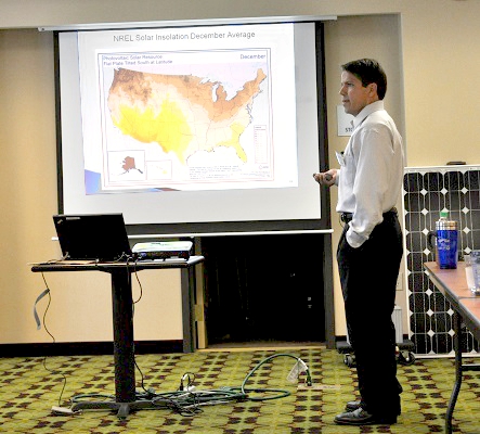 Mark Aragon, Nevada DOT, shows solar insolation maps during his team’s technical presentation on photovoltaic power systems for Rural ITS. (2011)