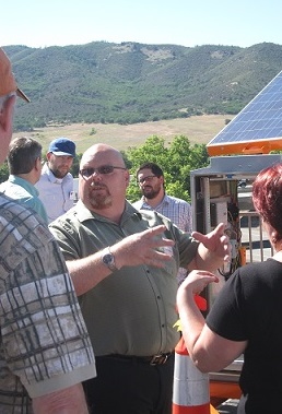 Jon Dickinson explains the Nevada DOT mobile ITS hotspot trailer presented at WSF. (2012)