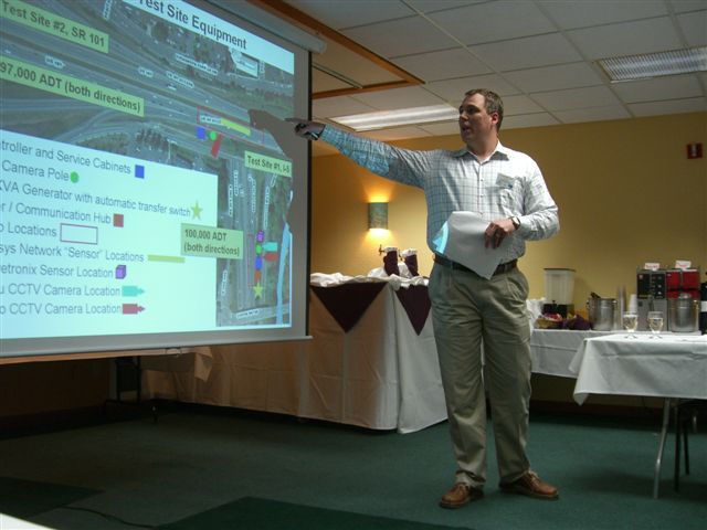Ted Bailey shows one of WSDOT’s test sites for wireless and microwave vehicle detection systems. (2008)