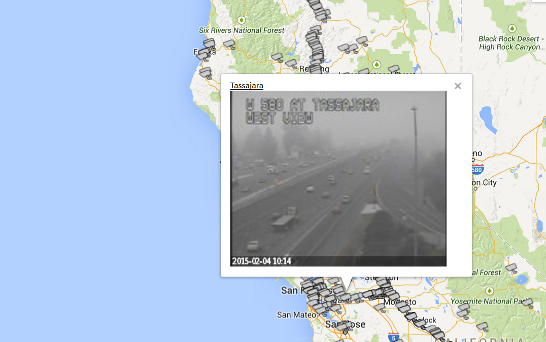 A Caltrans CCTV on W 580 shows low visibility at ground level.