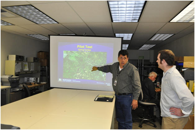 Ian discussing the pilot test site at Spring Garden with Kelvin.