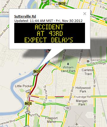 Road warning sign at I-5 and Sutterville Rd displaying: Accident at 43rd, Expect Delays.