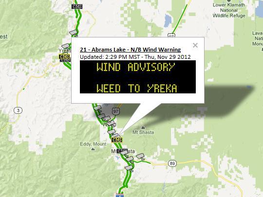 Road warning sign at I-5 and Abrams Lake North Bound displaying: Wind Advisory, Weed to Yreka