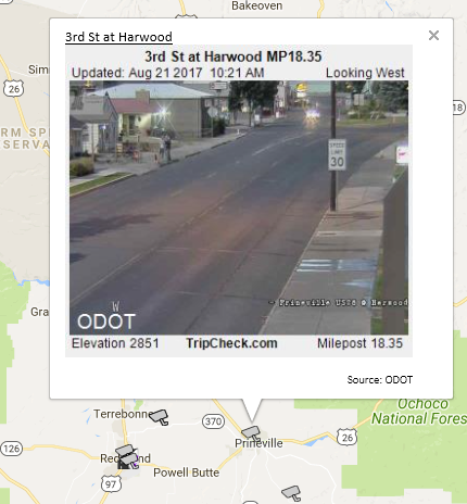 CCTV Image from Prineville, Oregon showing car headlights.