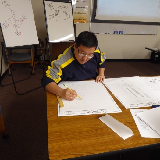 Andrew Chang from Caltrans District 3 works through one of the lab exercises during the small data center design class.