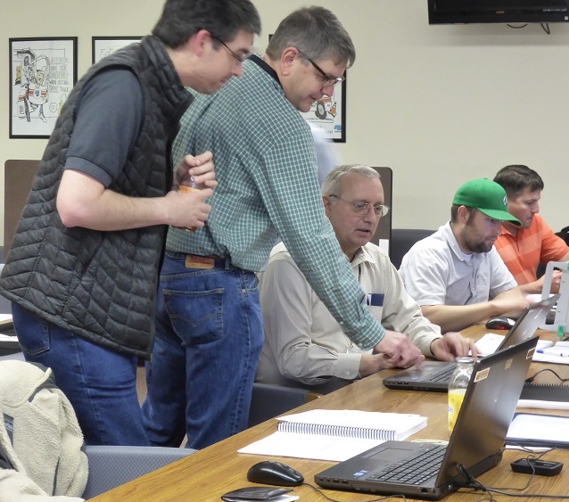 From left:  Michael Mullen (Caltrans District 3), Sean Campbell (Caltrans DRISI), and Mike Beyer (Caltrans District 2).  Background:  Jeremiah Pearce (Caltrans District 2) and Brian Finck (Caltrans District 1).