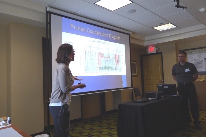 Julie Kentosh (left) and Doug Spencer (right) discuss signal coordination results.