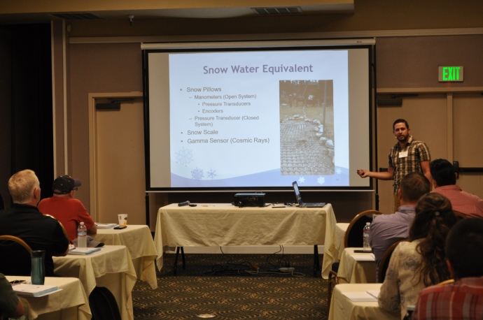 Bryan Prestel, California Department of Water Resources, describes the sensors and equipment used for measuring the snow water equivalent.