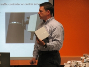 WSF speaker Matt Neeley holds a vehicle detection system component during discussion at the Forum.